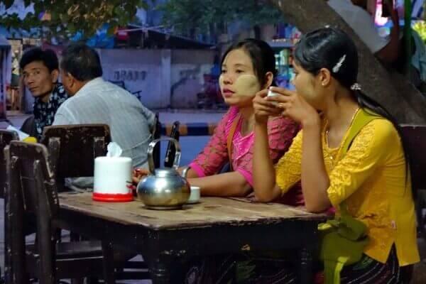 Women with thanaka in the teashop