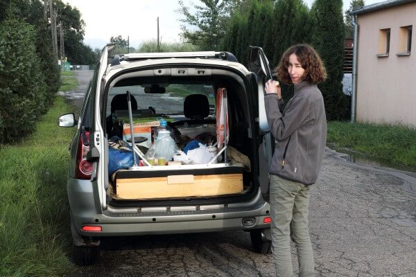 Our new car, Logan MCV with a lot of stuff. Having lunch somewhere in the fields of Poland.