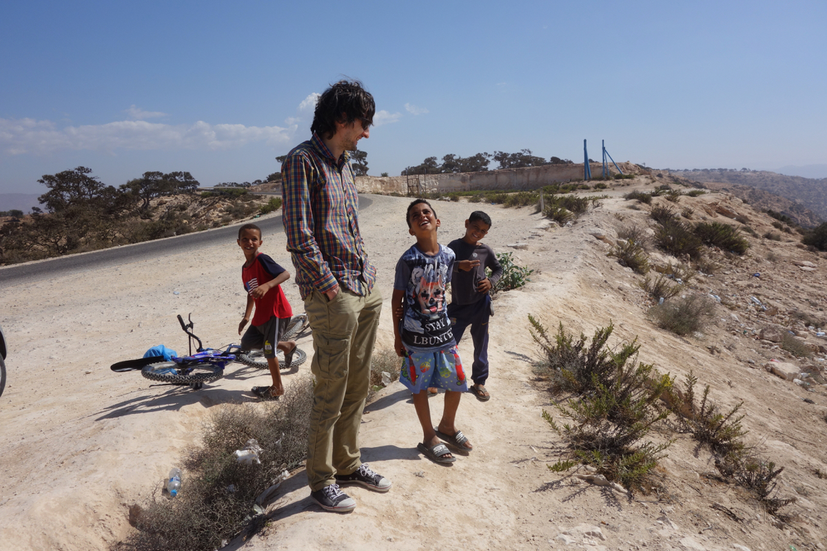 Volchiy is chatting with local kids