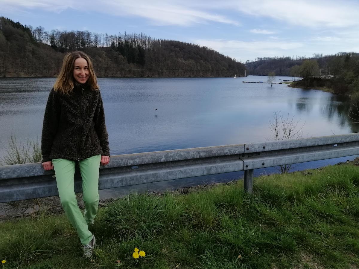 I’m by the dam on the other side, where it’s divided by a road. It’s getting dark.