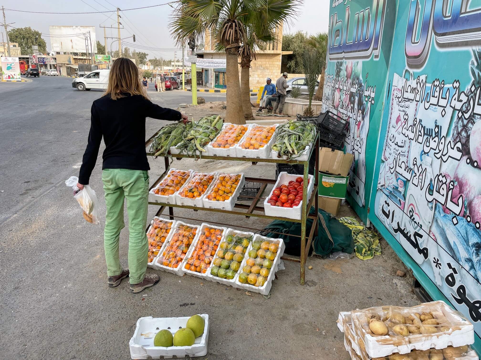 Roadside fruit stand Returning to Madaba by the same road. The sun is already sinking toward sunset.