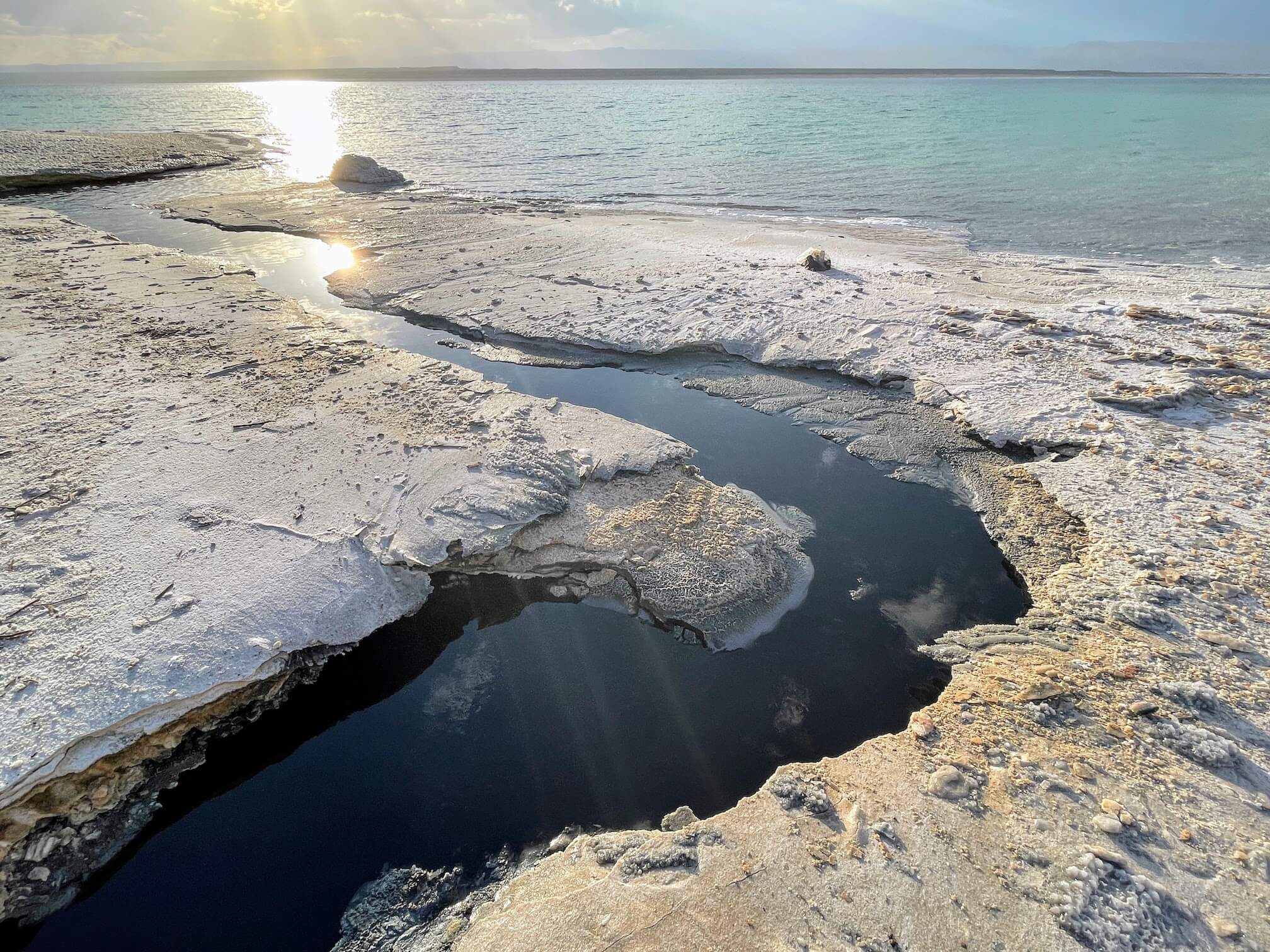 The stream flows into the sea