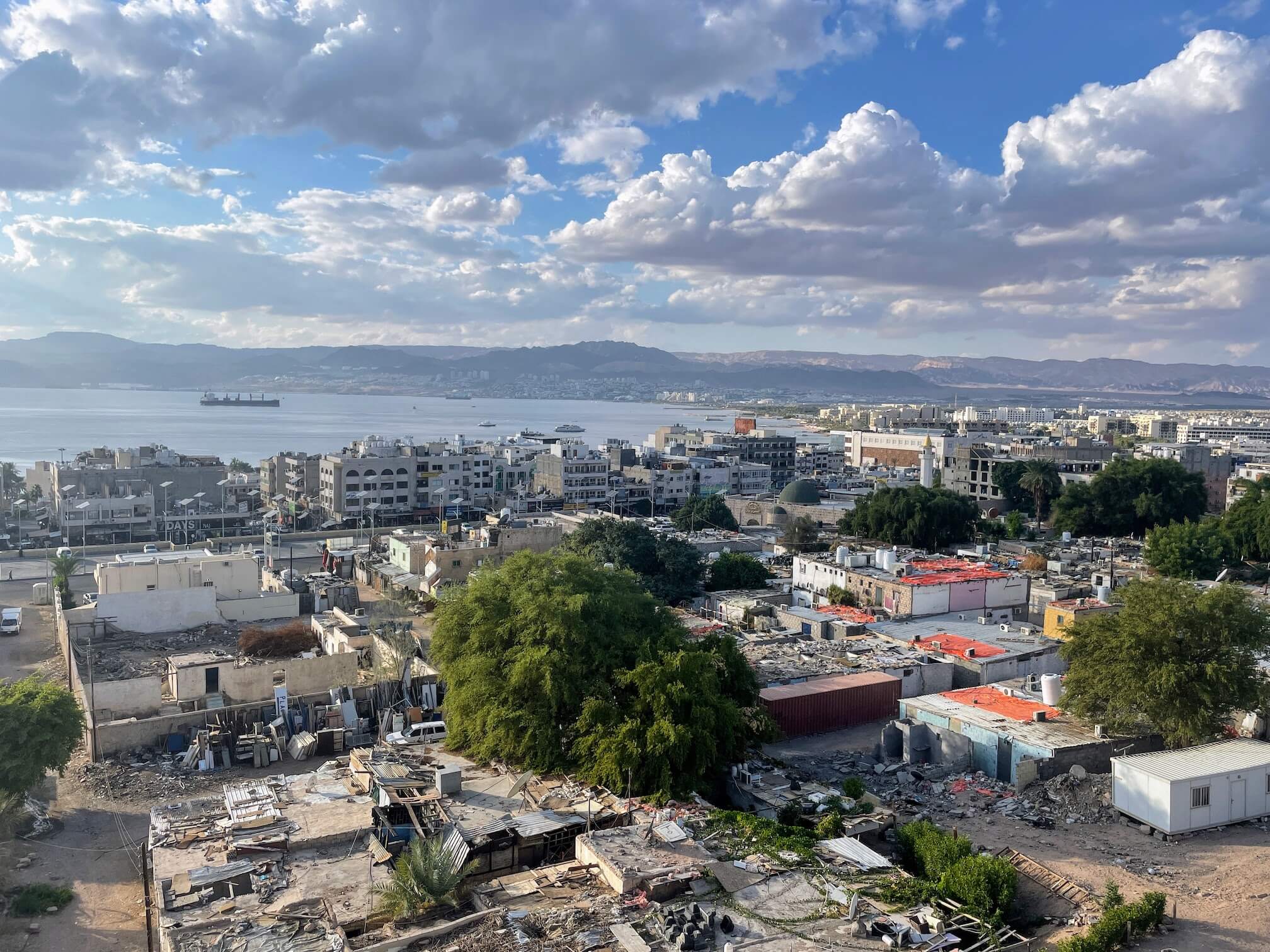 View from the balcony. The slums below the hotel are visible.