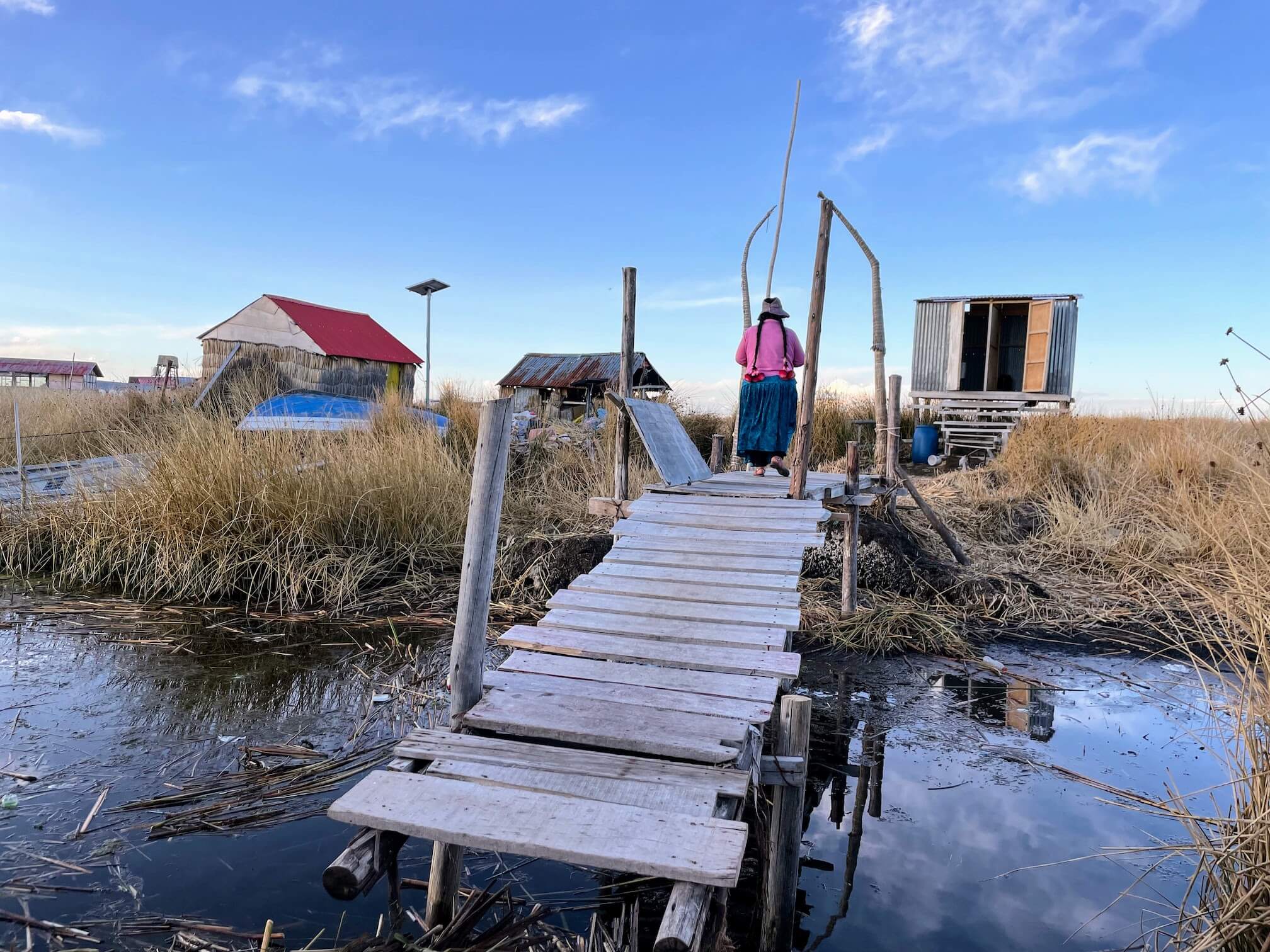 From the island, you can walk across the bridge to the restroom.