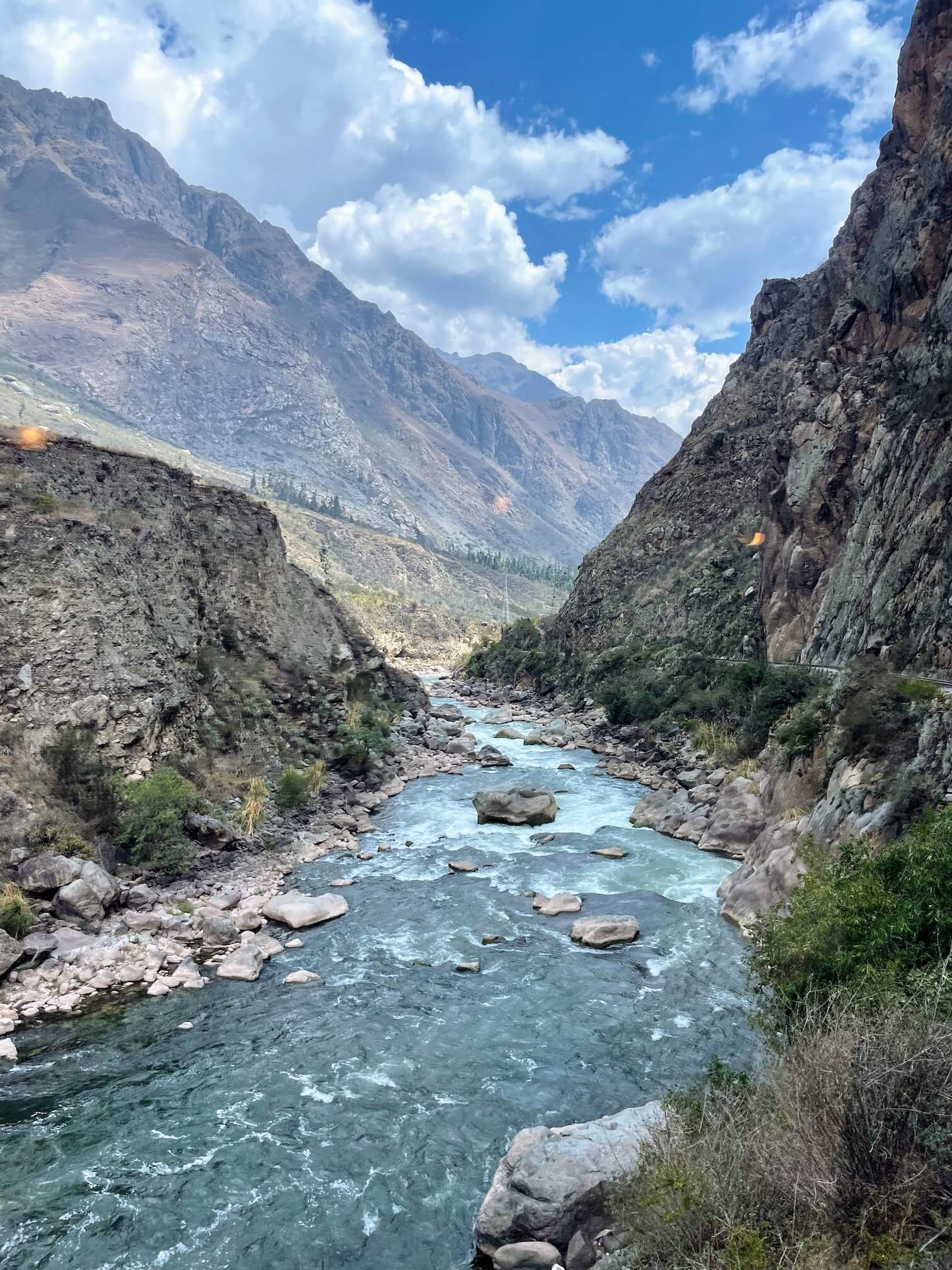 Driving along the river among the mountains