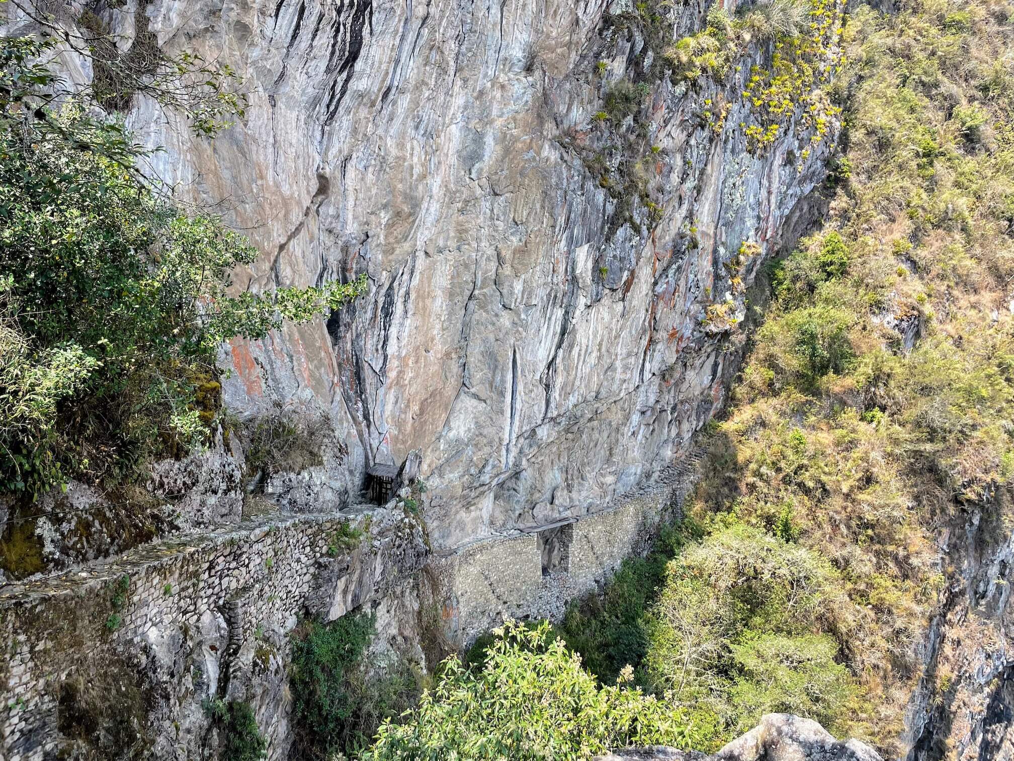 At the bottom center, a hole is visible, and above it there is a small bridge