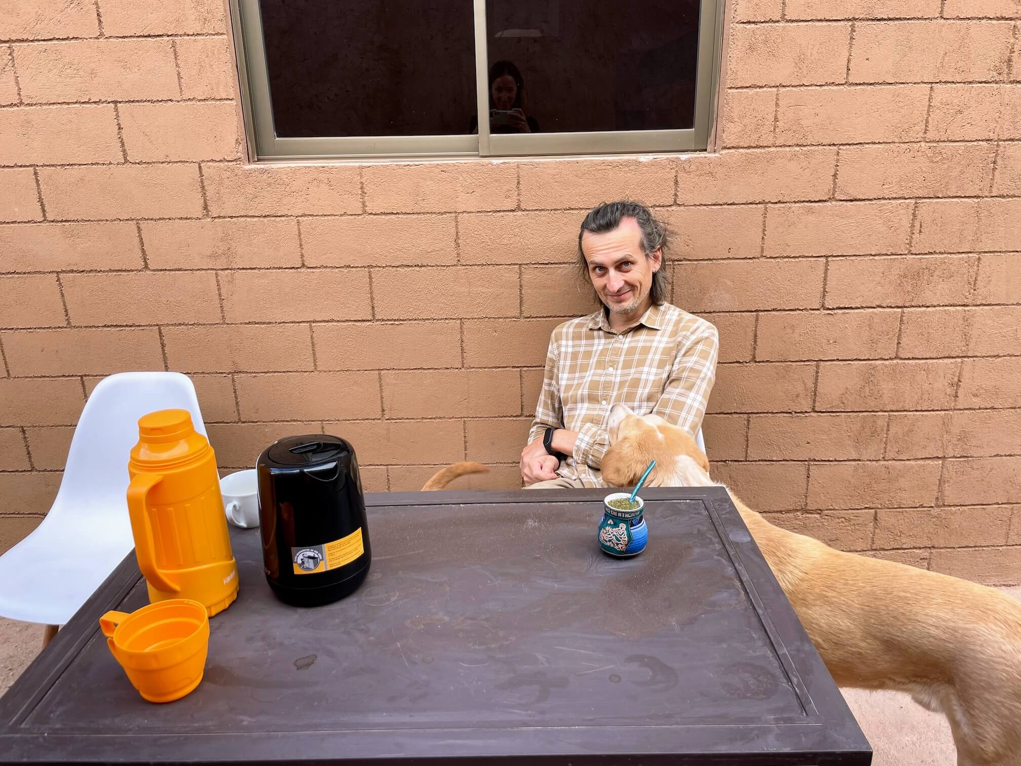 Upon arriving home, Serzhyk tries out the calabash. Our neighbor’s dog came over.
