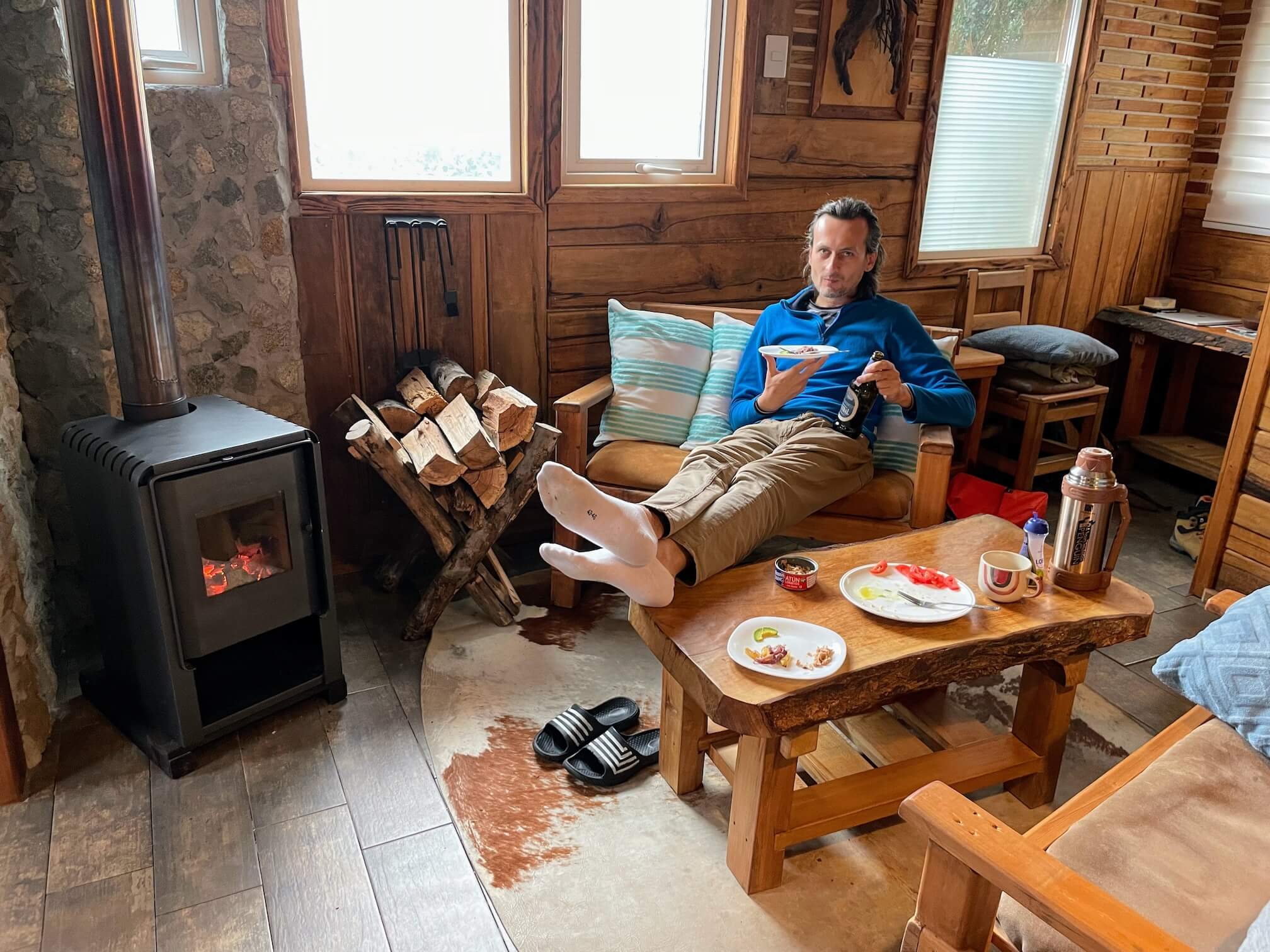 Dinner. Serzhyk is drinking beer. The firewood crackles in the stove. Life is прекрасна!