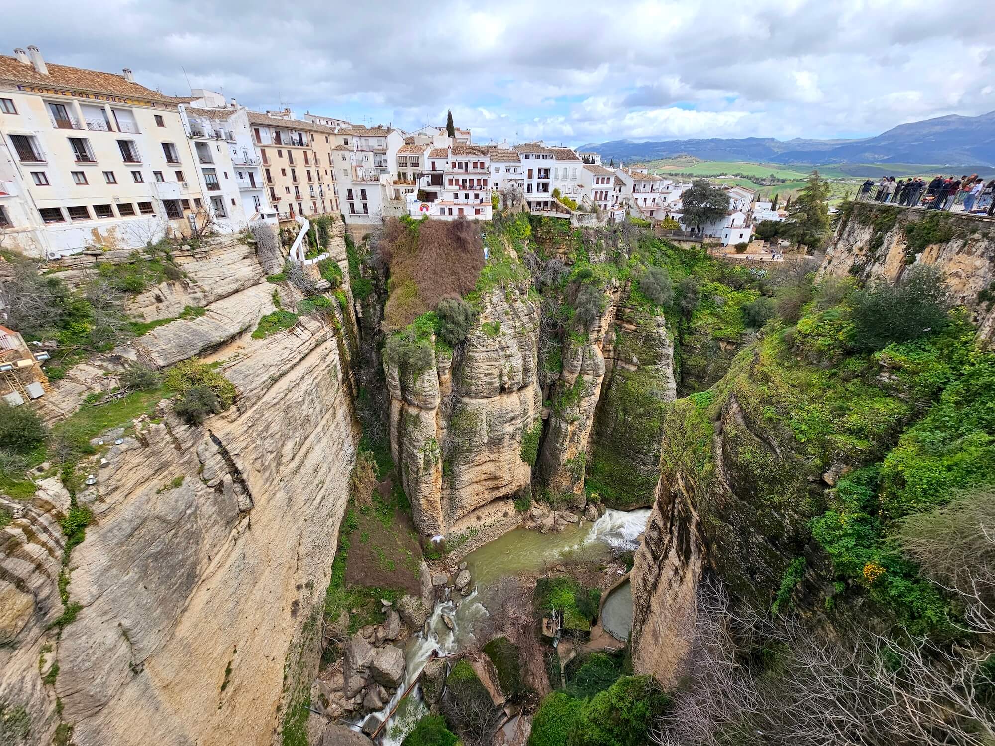 View from the bridge. Ronda seems to hang over the canyon.
