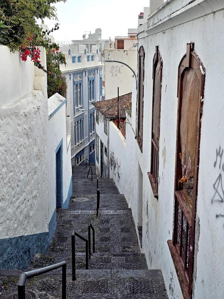 Many streets are stairs because the city is built on a slope.